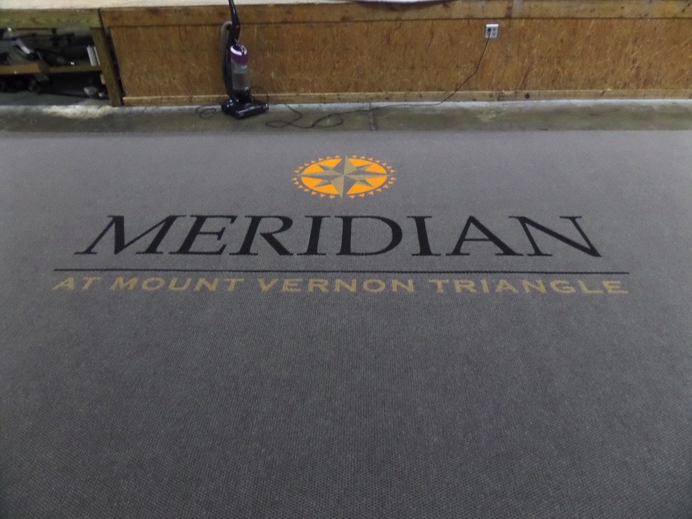 Custom matting installed at a Class A building entrance